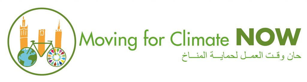 Cartel de la marcha ciclista Sevilla-Marrakech, con motivo de la COP22, que salió de Sevilla el 14 de noviembre y busca concienciar de la necesidad de luchar contra el cambio climático, ha sido organizada por la Red Española del Pacto Mundial de las Naciones Unidas e Iberdrola, bajo el lema "Moving for Climate NOW".