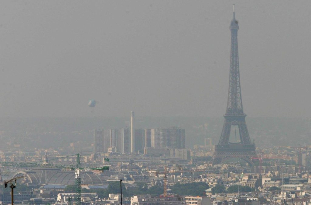 An aerial view of The Eiffel Tower in the haze on Monday 16 June 2003 in Paris. The French capital and its region had a ozone pollution peak 16 June, rising up to 180 mg/m3. Speed limitation for cars were among precautions to limit the pollution which increased also due to very high temperatures. EPA PHOTO/SIPA/ALFRED[FRANCE OUT]