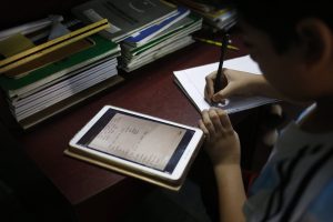 Dhaka (Bangladesh), 20/04/2020.- Bangladeshi English medium school student uses a tablet during an online lesson at home in Dhaka, Bangladesh, 20 April 2020. Countries around the world are taking increased measures to stem the widespread of the SARS-CoV-2 coronavirus which causes the COVID-19 disease. EFE/EPA/MONIRUL ALAM ATTENTION: This Image is part of a PHOTO SET[ATTENTION: This Image is part of a PHOTO SET]